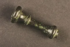 This is a handle of a pestle for use with a mortar for grinding spices, herbs, fruit, nuts, other food items, or medicine.